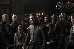 Ned defends Arya at the Inn
